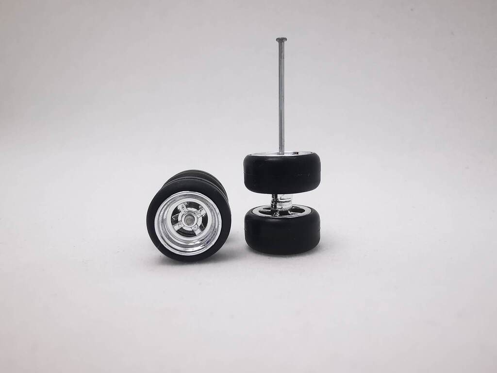 4 spoke jdm 11mm chrome ring, black tire