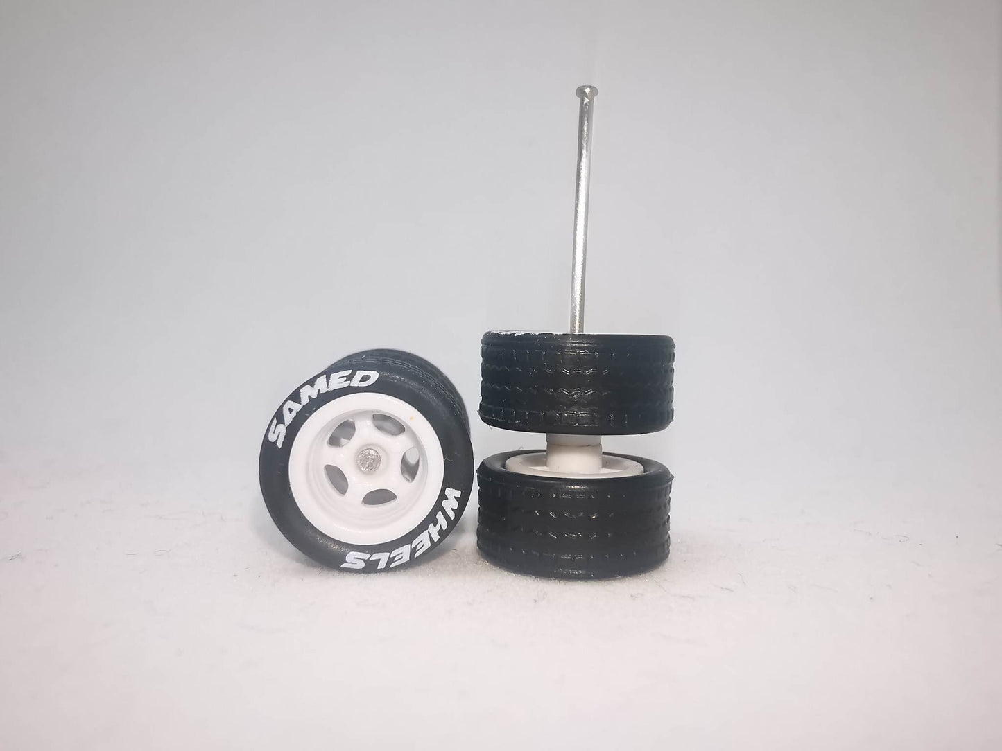 5 bolt 10 mm white ring, black tire with letter