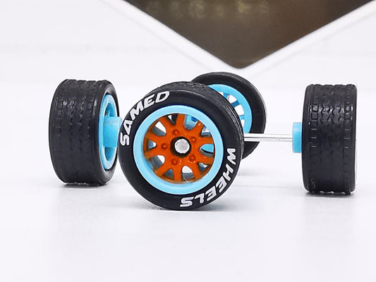 Thunder 10 mm orange blue ring, Black tire with white lettering DISTRIBUIDORES