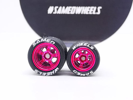 5 bolt 10/12mm Pink Mexican ring, black tire with lettering DISTRIBUIDORES