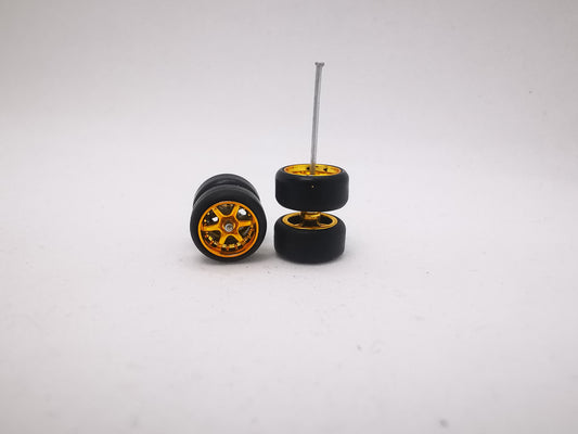 6 spoke jdm 11mm gold ring, black tire DISTRIBUIDORES