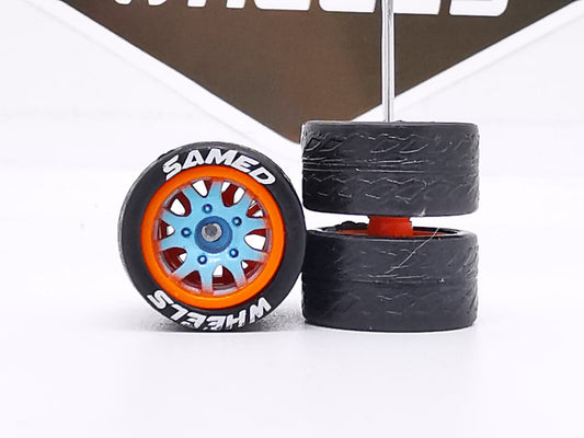 Thunder 12 mm blue orange ring, Black tire with white lettering DISTRIBUIDORES