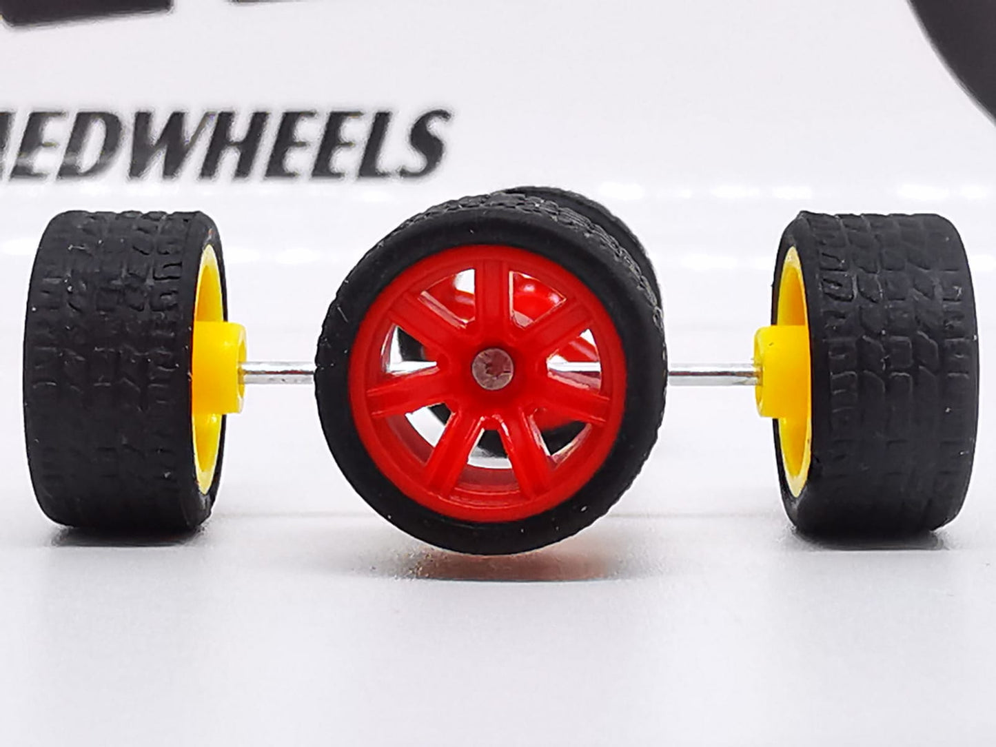 7 spoke jdm 11mm red, black tire not removable