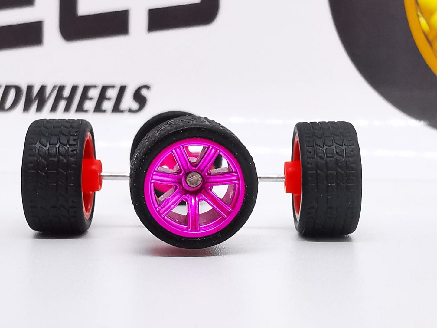 7 spoke jdm 11mm Mexican pink, black tire not removable