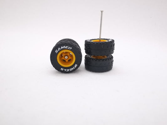 JAGUAR WARRIOR AT 10 MM 5 bolt brown ring, black tire with lettering DISTRIBUIDORES