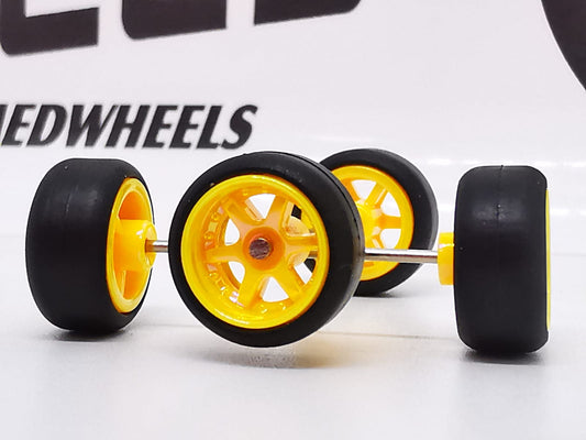 6 spoke jdm 11mm Metallic yellow ring, black tire DISTRIBUIDORES
