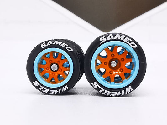Thunder 1012 mm orange blue ring, Black tire with white lettering DISTRIBUIDORES