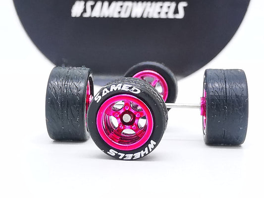 5 bolt 10 mm Pink Mexican ring, black tire with lettering DISTRIBUIDORES