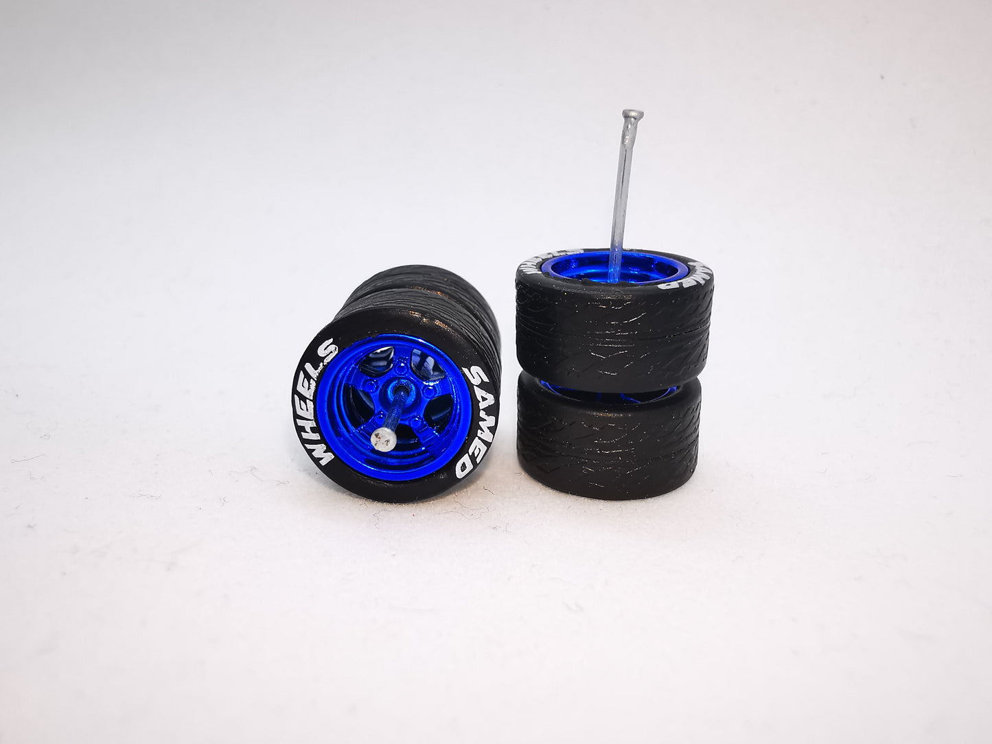 5 bolt 12 mm blue ring black tire with lettering