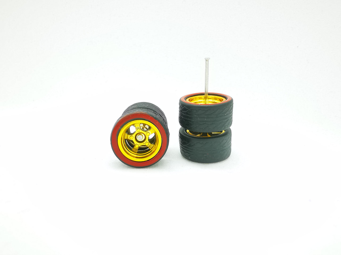 5 bolt 12 mm gold ring, black tire with red line
