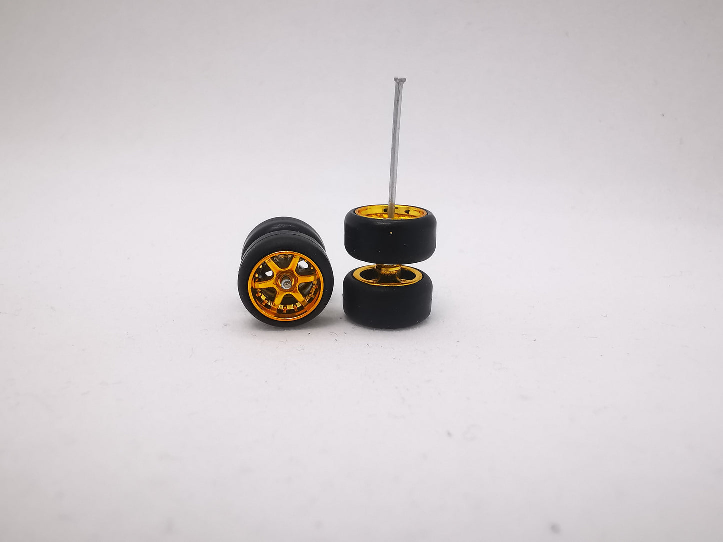 6 spoke jdm 11mm gold ring, black tire