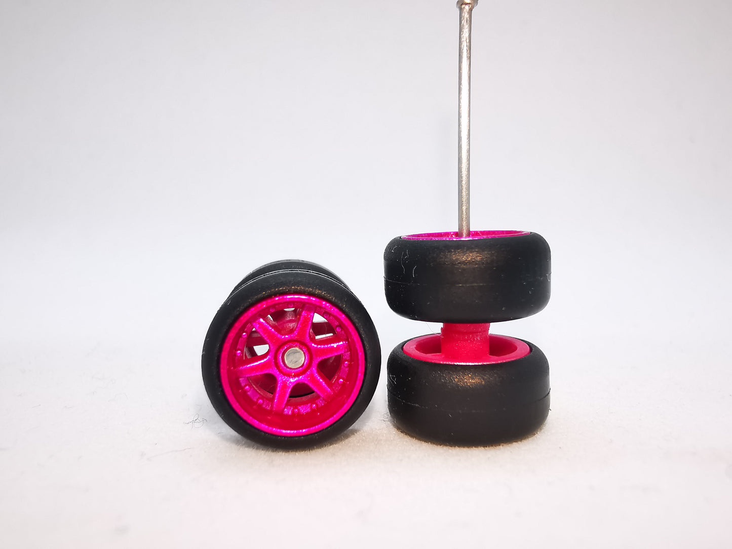 6 spoke jdm 11mm mexican pink ring, black tire
