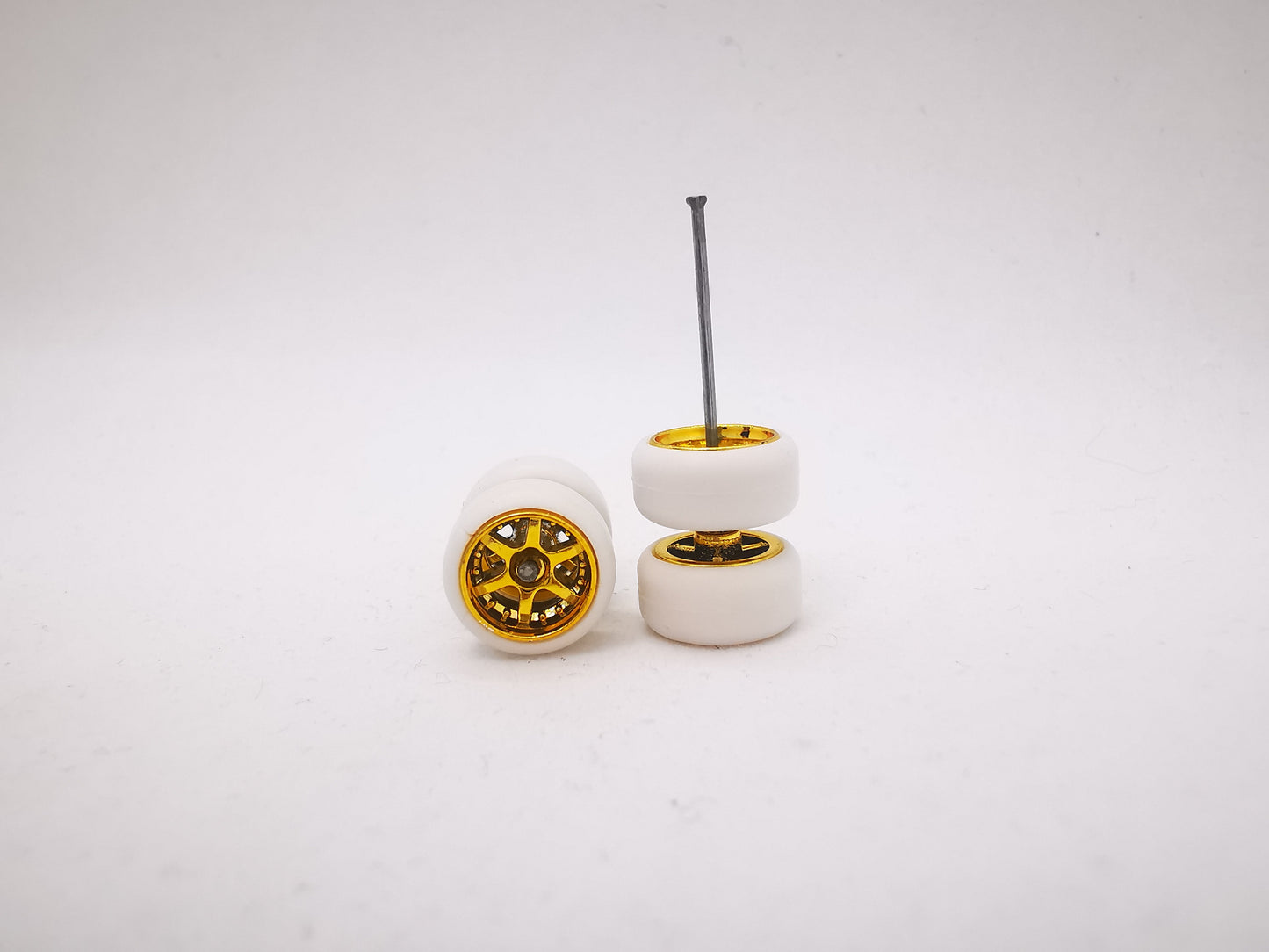 6 spoke jdm 11mm gold ring, white tire