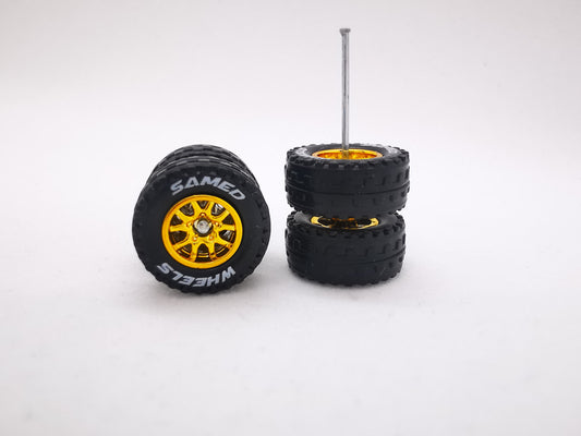 JAGUAR WARRIOR AT 10 MM thunder gold ring, black tire with lettering