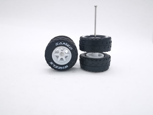JAGUAR WARRIOR AT 11 MM 6 spoke white ring, black tire with lettering