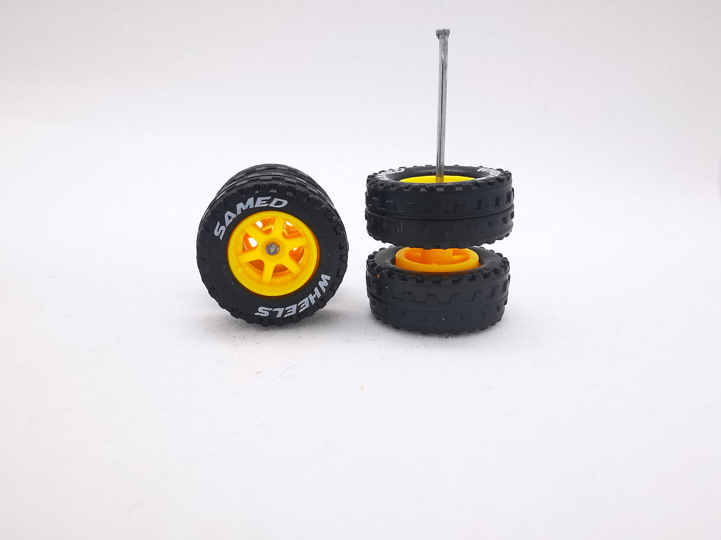 JAGUAR WARRIOR AT 11 MM 6 spoke yellow ring, black tire with lettering